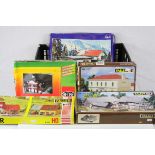 Five boxed HO/OO gauge model railway trackside model kits to include 3 x Faller (1101, 370 &