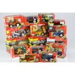 15 boxed Britains 1:32 diecast tractors and other agricultural implements, to include nos. 9343,