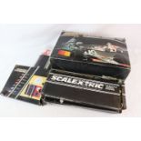 Boxed Scalextric 200 to include track, 2 x slot cars, 2 x controllers, power pack, and instruction