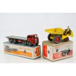 Two boxed Dinky Supertoys diecast models to include 562 Dumper in yellow with red hubs, driver