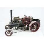 Large well built steam engine, metal, in black with maroon, approximately 2 foot in length,