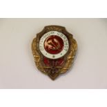 A Russian / Soviet Excellent Signaller Badge With Red And White Enamel Detailing.