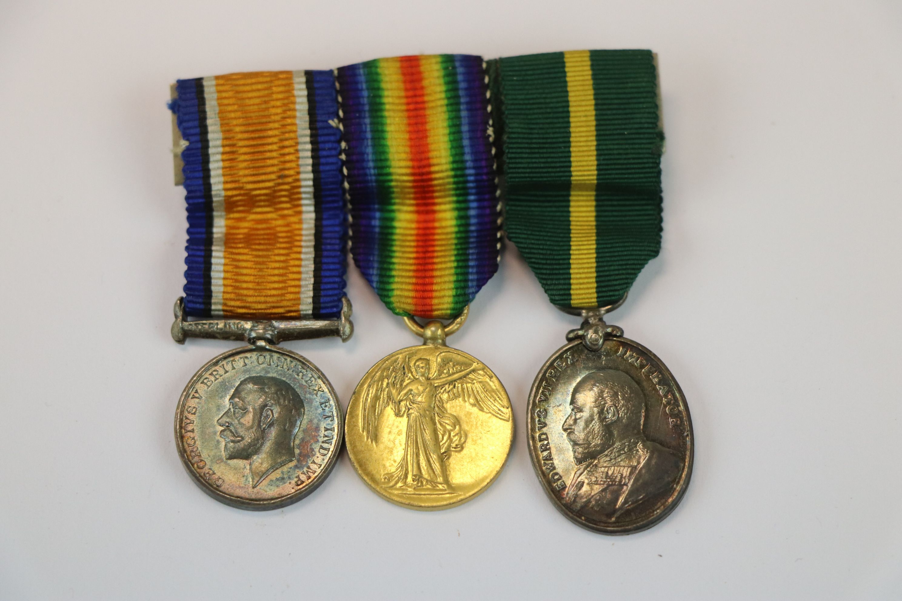 A World War One / WW1 Miniature Medal Trio To Include The British War Medal, The Victory Medal And