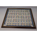 A Collection Of Framed And Glazed Royal Air Force Badges Cigarette Cards By John Player & Sons.