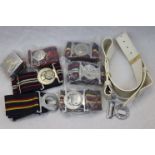 A Collection Of 7 British Military Stable Belts Complete With Regimental Buckles.