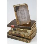 Six antique leather bound books, to include Book of Common Prayer printed by Thomas Bentham 1745,