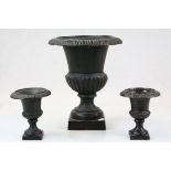 Three Cast Iron Urns, largest approx 26cm tall with black finish