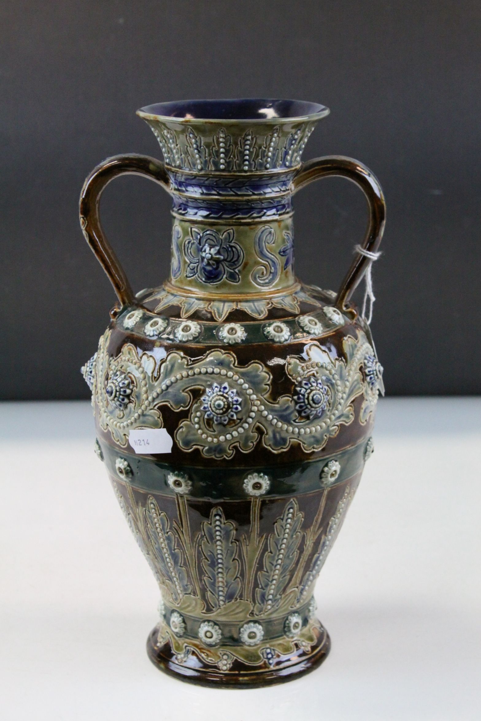 Doulton Lambeth Glazed twin handled Stoneware vase 1874 with incised & applied Floral decoration,