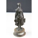 Bronzed Figure of a 19th century Milk Maid on Wooden Plinth, 24cms high