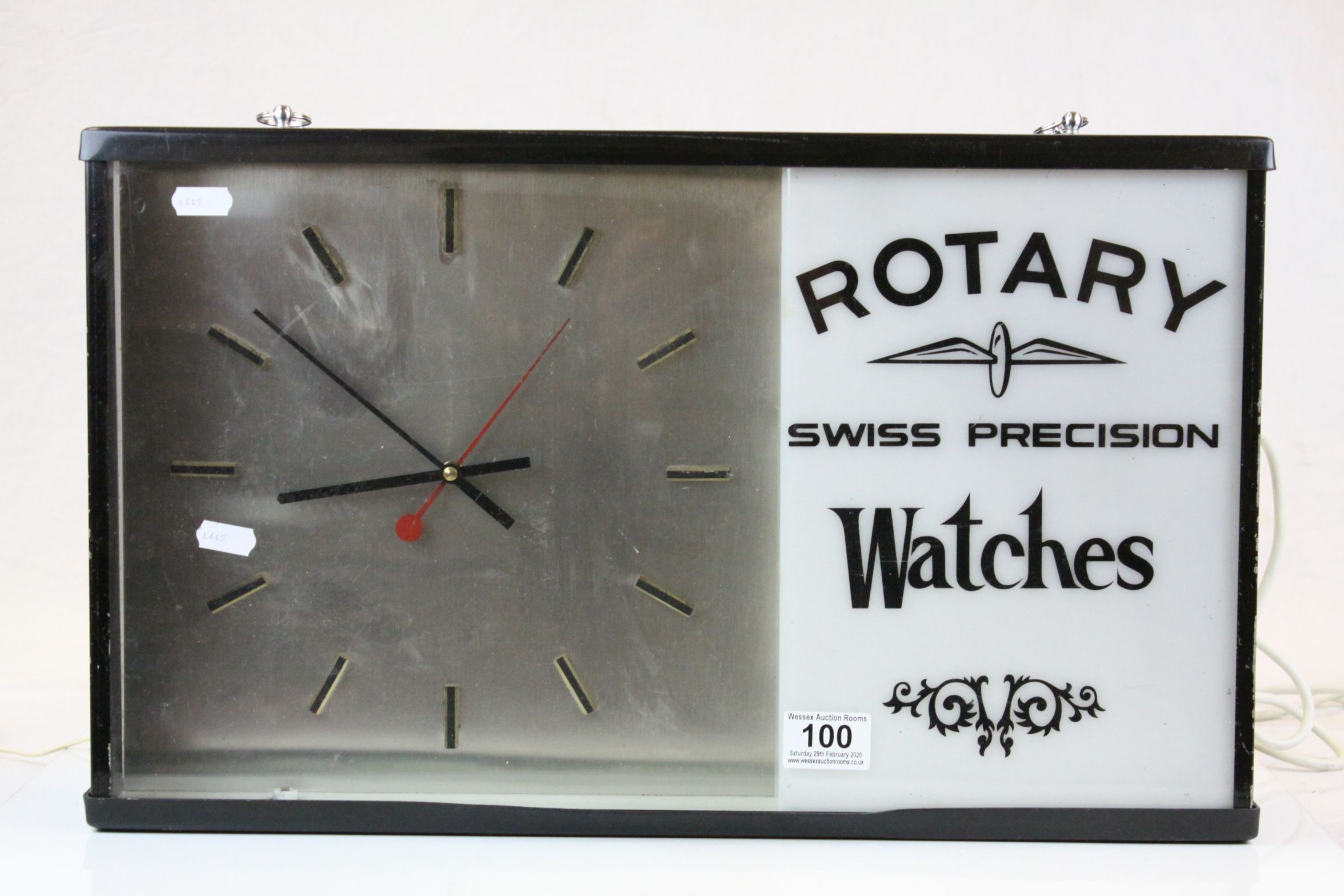 Advertising electric Wall Clock for "Rotary Swiss Precision Watches", measures approx 51 x 31 x