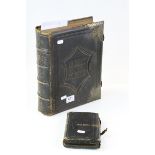 19th century leather bound self interpreting family bible, together with one other smaller bible