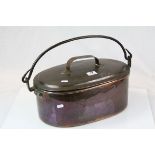 Lidded Copper cooking pot with cast Iron swing carry handle & silvered interior, measures approx