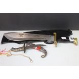 A Ranger 440-A Stainless steel bowie knife with leather sheath together with another decorative