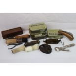 A box of mixed collectables to include penknives, fans, stamps and bone dominoes.