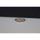 Yellow gold two stone diamond ring