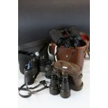 Pair of early 20th century leather cased field binoculars, pair of Yashica cased binoculars & one