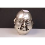 White metal four faced Buddha paperweight, signed