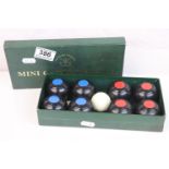 A boxed set of mini carpet bowls by Townsend Croquet Ltd.