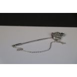 Silver tie/cravat pin set with CZ's to a crown