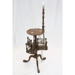 *Mahogany Lamp Table, the circular table top with raised rim, a turned lamp stand affixed to a