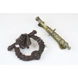 19th Century cast iron door knocker by Kenrick & Sons and a brass cannon knocker