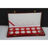 A cased set of twelve silver chinese lunar animal coins by The Shanghai Mint.