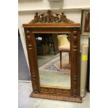 Large oak framed mirror with carved decoration