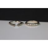 Two silver rings set with CZ's