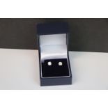 Pair 14CT white gold diamond stud earrings of 1CT approx