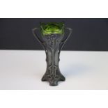 A WMF Jugendstil electroplated twin handled bud vase, cast with flowers on sinuous stems terminating