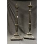 Pair of large wooden ebonized candle pricks