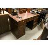 19th century Oak Twin Pedestal Writing Desk set with a Brown Leather Writing Surface over an