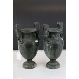 Pair of 19th century Cast Classical Twin Handled Urns on Green Marble Bases, 28.5cms high