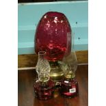 Antique brass oil lamp with cranberry dimpled shade & two oil lamps with cranberry glass wells (3)