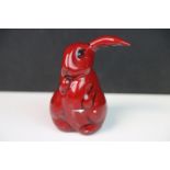 A Royal Doulton Flambe red figurine of a lop earred Rabbit with one ear sticking up, measures approx