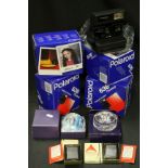 Three boxed Polaroid 366 cameras, two vintage boxed Zippo lighters & two paperweights