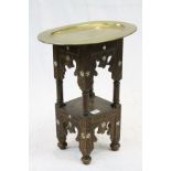 Indian Carved and Bone Inlaid Side Table with Oval Brass Tray Top, 45cms wide x 56cms high