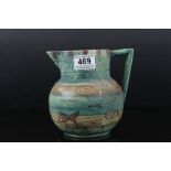 Early 20th century Shorter & Sons art pottery jug with etched sgraffito decoration, signed to