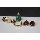 Yellow metal mounted stone Buddha pendant, a pair of Monet clip on earrings, a pair of similar amber