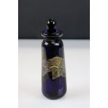 Mid 20th century blueglass scent bottle with gilt stylised decoration, indistinctly signed to