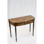 Early 19th century Mahogany Fold-over Tea Table with Curved Front raised on turned tapering reeded