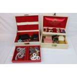 Two vintage jewellery boxes containing a selection of jewellery and watches to include silver