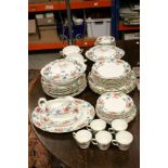 Early 20th century floral decorated part dinner service, Booths 'Floradora' to include tureens,