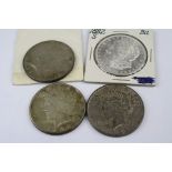 Four USA Silver Dollar coins to include; 1882, 1922 x 2 & 1923 (4)