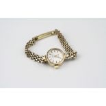 Roamer 9ct yellow gold ladies wristwatch on 9ct yellow gold bracelet strap, silvered dial with