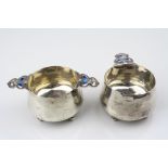 Pair of Edwardian Art Nouveau enamelled silver salts of cauldron form raised on four ball feet, blue