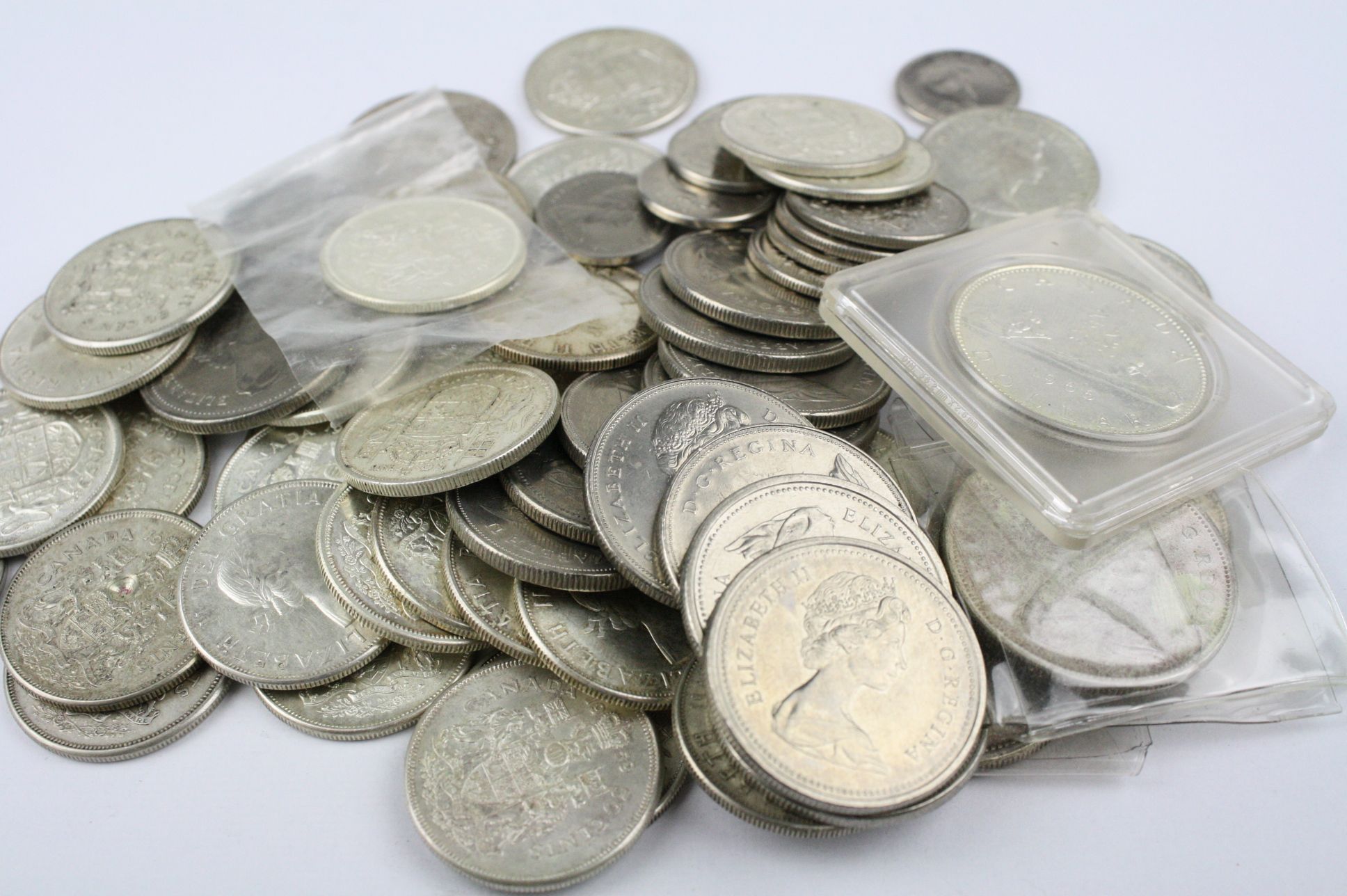 Large collection of Canadian Queen Elizabeth II coins to include Silver Dollars, 50 cent Half
