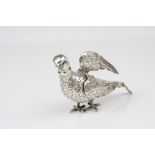 Edwardian silver vinaigrette modelled as a bird, textured body and articulated wings, the head