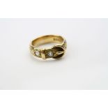 Diamond 18ct carat yellow gold buckle ring, the band with floral and foliate scroll decoration and