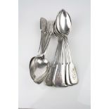 Twelve Russian silver fiddle pattern table spoons, engraved monogram to terminals, combine city